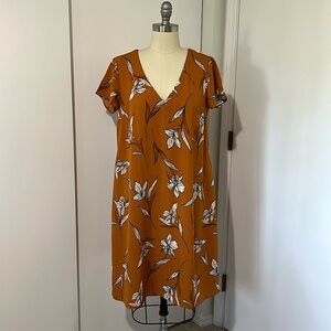 Orange dress with floral print, side pockets!